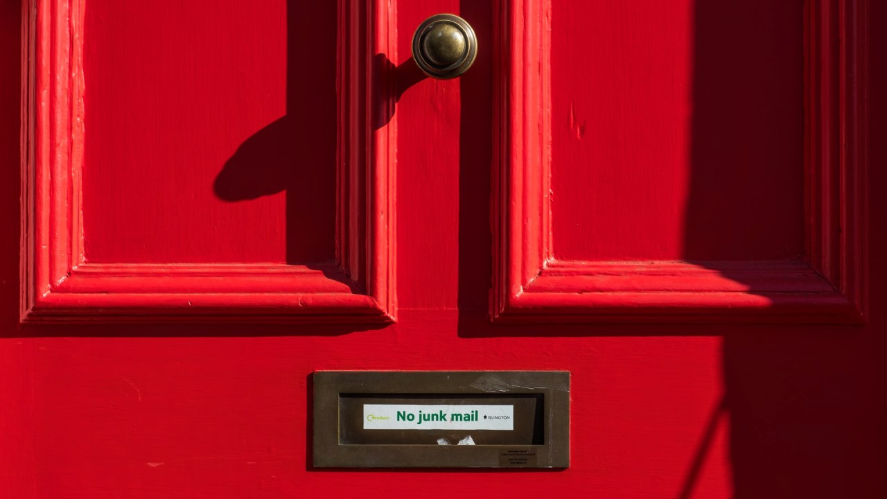 mail slot on door that says "no junk mail"