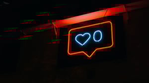 neon light favorite button representing online reputation management